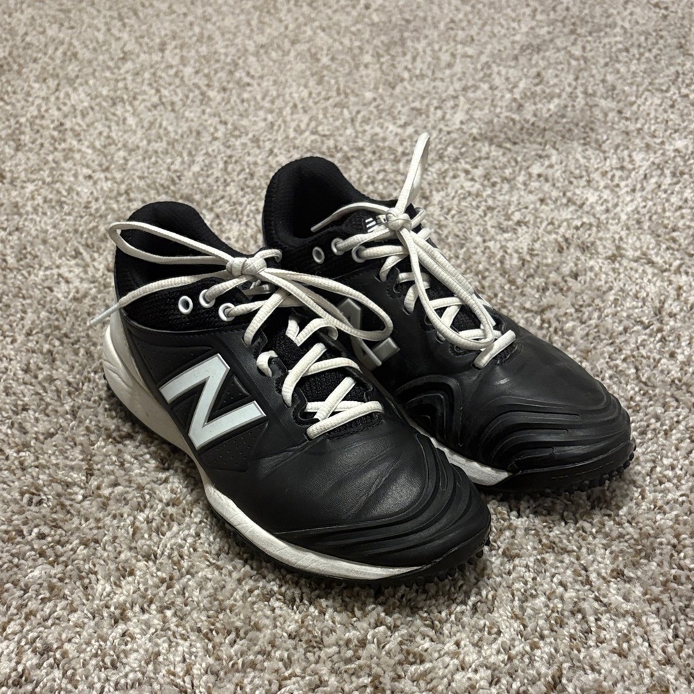 New Balance Black and White Turf Shoes
